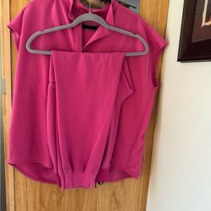 Large electric orchid, I think, Rafaela and high waisted joggers.